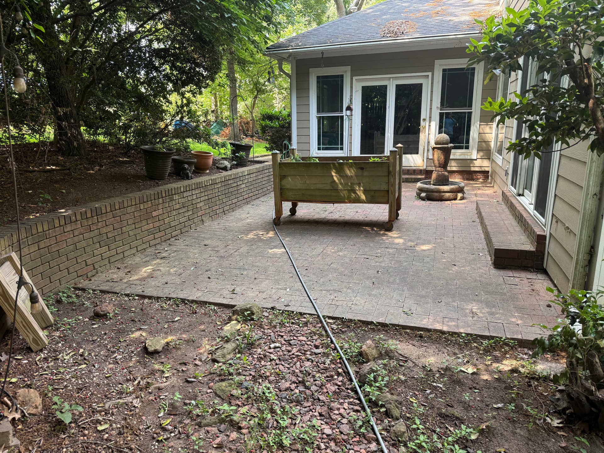 Gallery photos for Driveway and Brick Patio Pressure Washing Before and After: Image #2