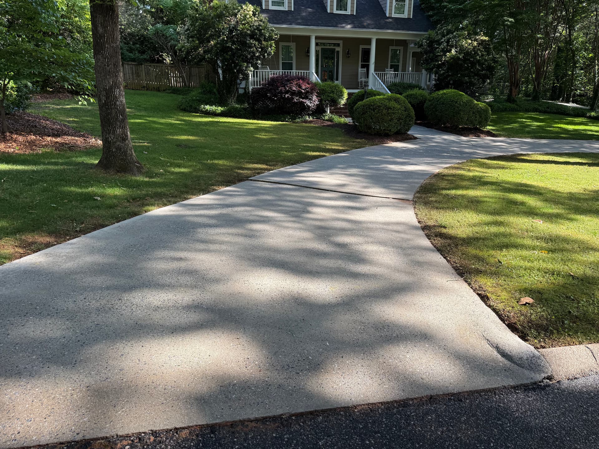 Gallery photos for Driveway and Brick Patio Pressure Washing Before and After: Image #1
