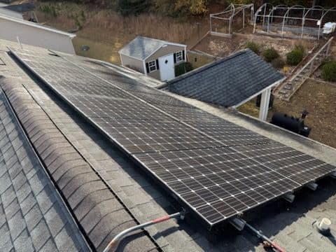 Project Enhanced Efficiency with Clean Solar Panels and Gutters image
