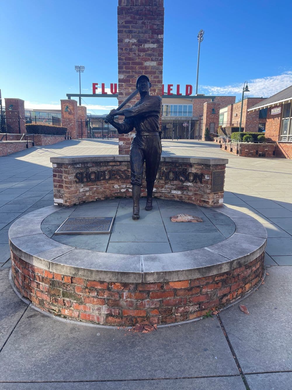 Statue of Shoeless Joe Jackson at Fluor Field, highlighting baseball history in Greenville, SC.