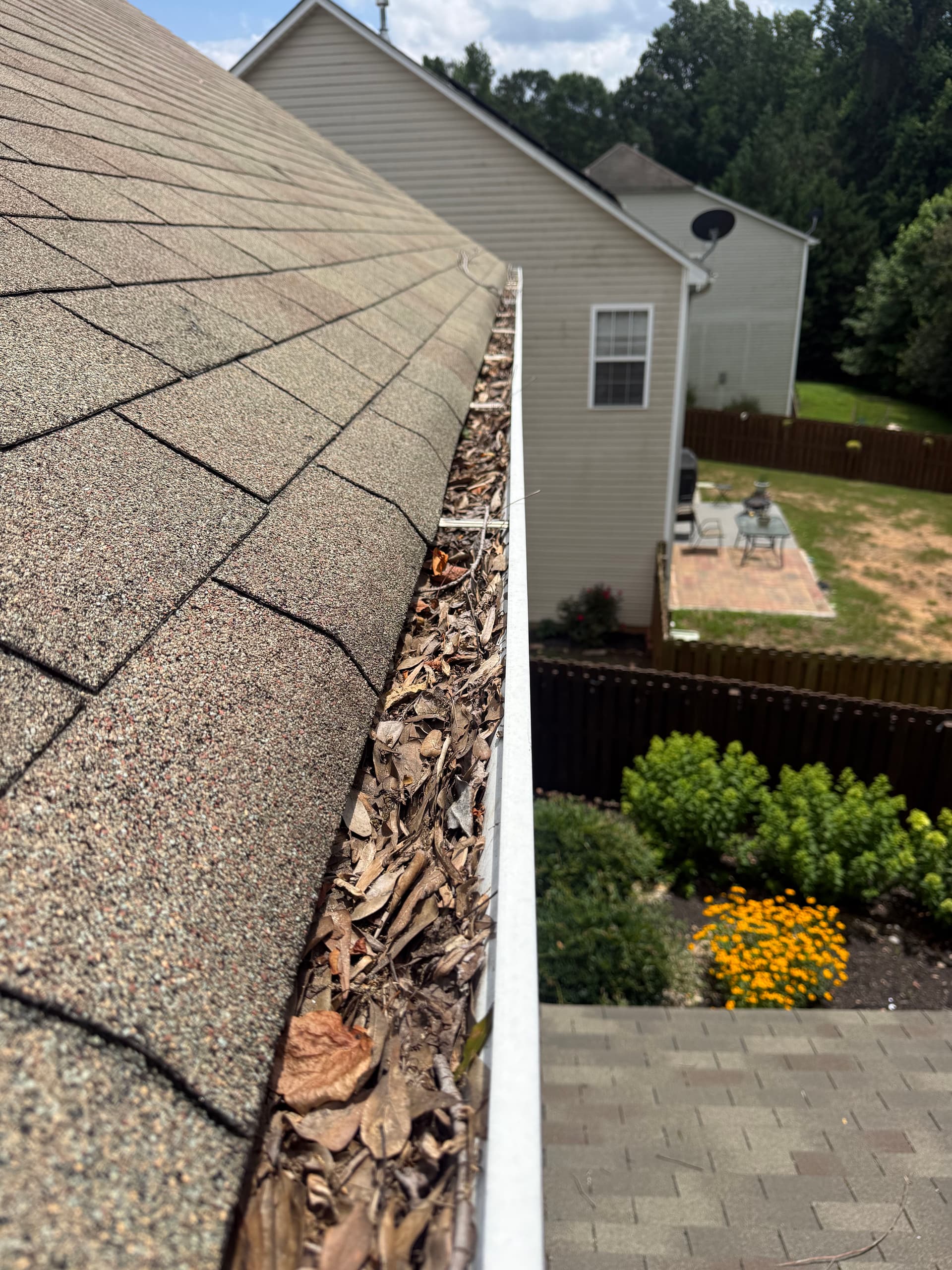 Gallery photos for Packed Gutters Are a Slow Drain on Your Home: Image #2